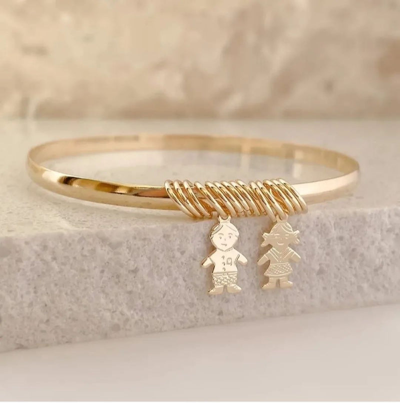 Pulseira Escrava Com Coração Bnhada a Ouro 18k Semi Joias Com 2 Bonecos